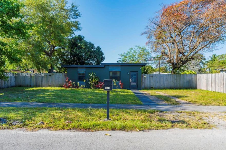 Fully remodeled and move-in ready, this charming home blends modern upgrades with everyday comfort. Thoughtfully updated throughout, it features impact windows and doors, a new roof, upgraded electrical panel, and new plumbing. Inside, you’ll find waterproof vinyl flooring and a bright, open kitchen with shaker-style cabinetry, quartz countertops, a full backsplash, and an extended counter perfect for seating or entertaining. Open, bright and functional layout, plus laundry area for added convenience. The spacious backyard offers endless potential with mature fruit trees, plenty of room for a pool, and space to accommodate a boat or camper. Ideally located just minutes from I-95, with easy access to the beaches, Downtown Miami, and Fort Lauderdale. Close to dining, shopping, houses of worship, and public transportation. A solid, stylish home with all the right upgrades in all the right places.