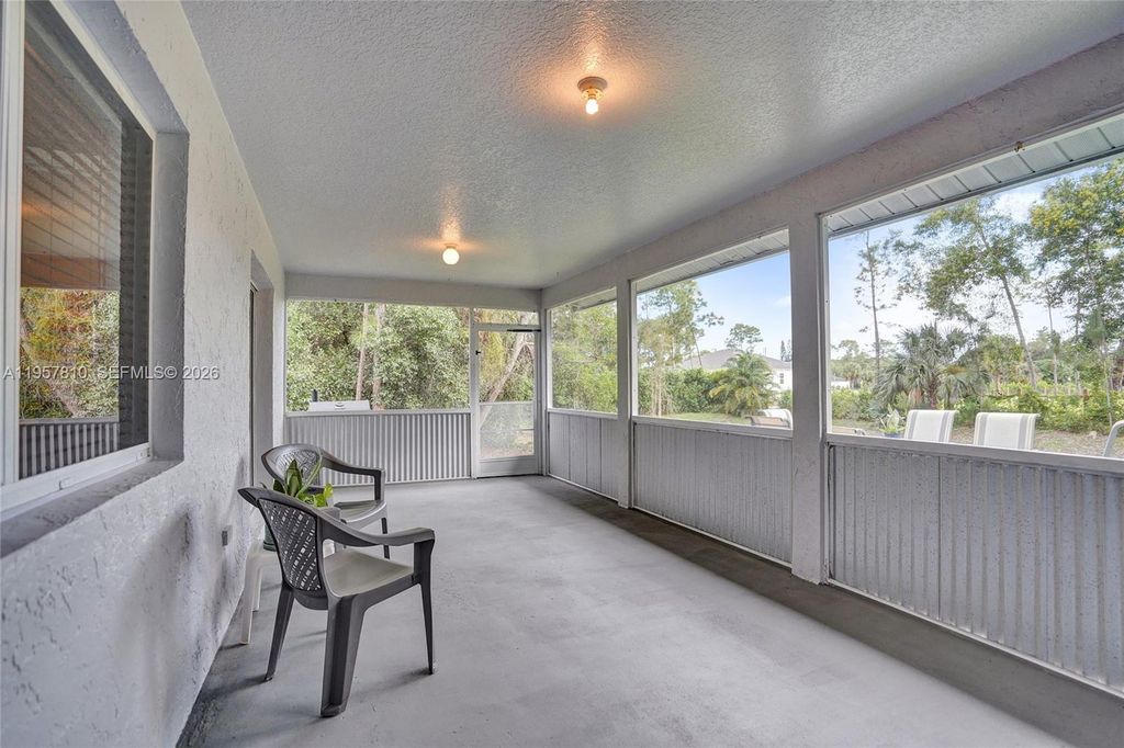 Photo of 14808 N 69th St N, Loxahatchee, FL 33470 (MLS # A11957810)