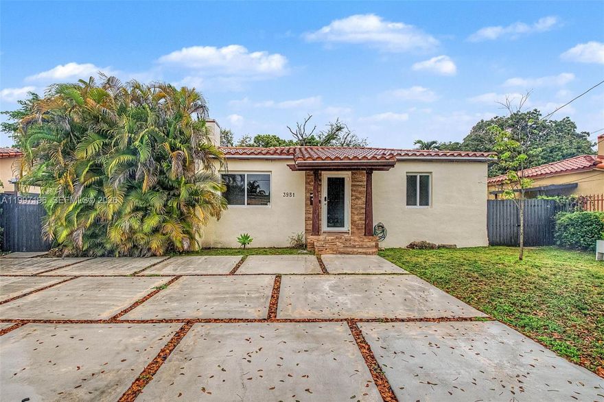 Opportunity knocks just minutes from Coral Gables. Situated on an expansive 8,364 SF lot, this charming home offers exceptional flexibility to move right in and create your ideal outdoor retreat (with ample room for a pool and generous yard space) or to expand the existing footprint of the home. The property features a 2-bedroom, 1-bath main home plus a separate 1-bedroom, 1-bath side unit, perfect for rental income, guests, or easily integrating back into a larger single-family layout. Inside, you’ll find warm wood floors with fireplace, an updated kitchen and bath, impact windows, and a newer A/C. Whether you’re looking to move right in, generate income, or grow into the property over time, this is a rare chance to secure space, flexibility, and location in one of Miami’s most central pockets.