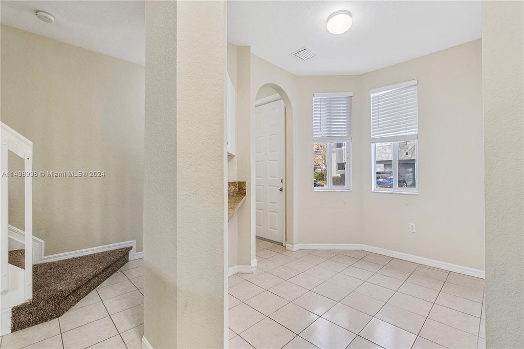 Photo of 3717 Sonoma Dr #3717, Riviera Beach, FL 33404 (MLS # A11498998)
