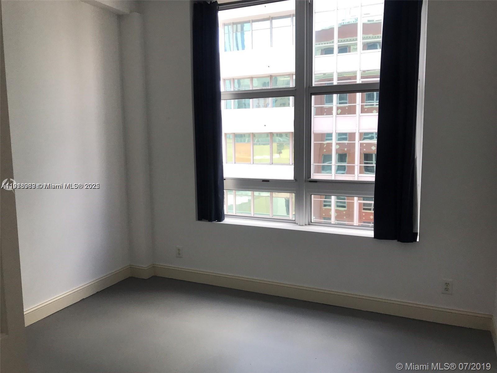 111 E Flagler St 803