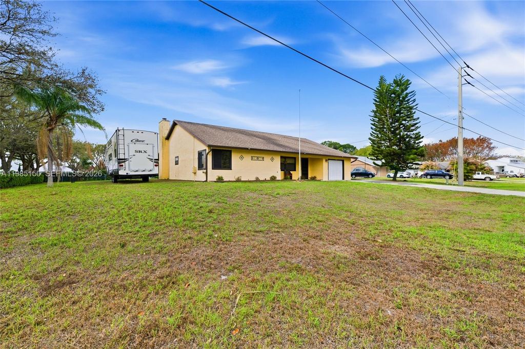 Photo of 2580 SW Bayshore Blvd, Port St Lucie, FL 34984 (MLS # A11985150)