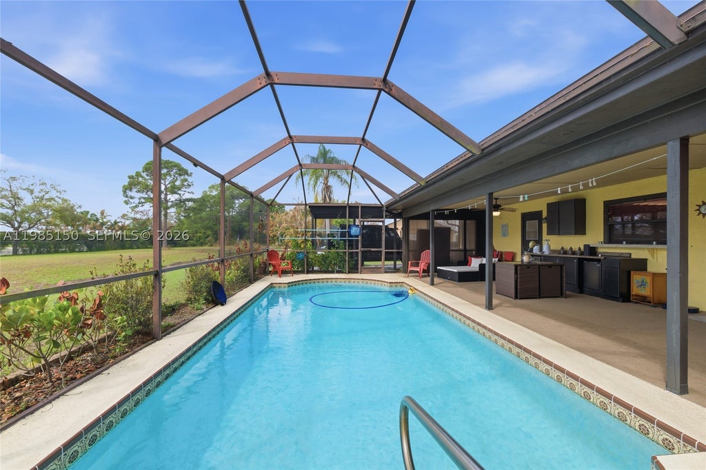 Photo of 2580 SW Bayshore Blvd, Port St Lucie, FL 34984 (MLS # A11985150)