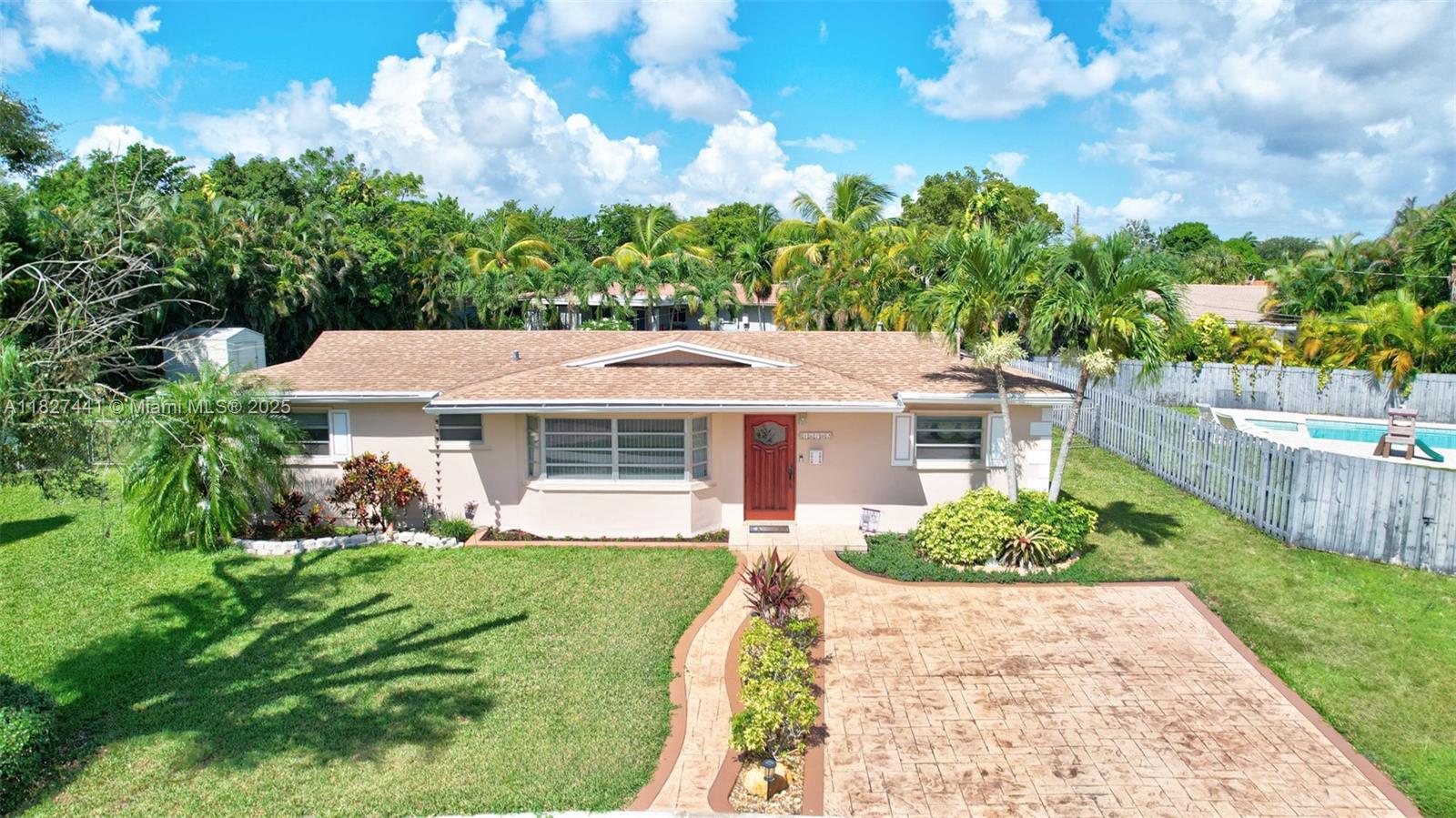 Welcome to this charming 4BR/2BA + office single-family home on a quiet cul-de-sac with an oversized lot offering privacy and potential. Features include a bright bay window, split floor plan & upgraded primary bath. One bedroom is used as a walk-in closet. The updated kitchen offers new quartz countertops, backsplash, double sink, gas stove, & white appliances. Enjoy the spacious family room providing a perfect place for gatherings. Impact French doors lead to large screened enclosure opening up to an amazing fenced backyard. Laundry room with storage. Shutters, smart lock, Ring doorbell. Freshly painted, room for a pool. Concrete slab ready for your RV, boat or basketball court. Shed stays. Well pump for sprinklers. Paver driveway. No HOA. Move-in ready and full of potential! ROOF 2021!