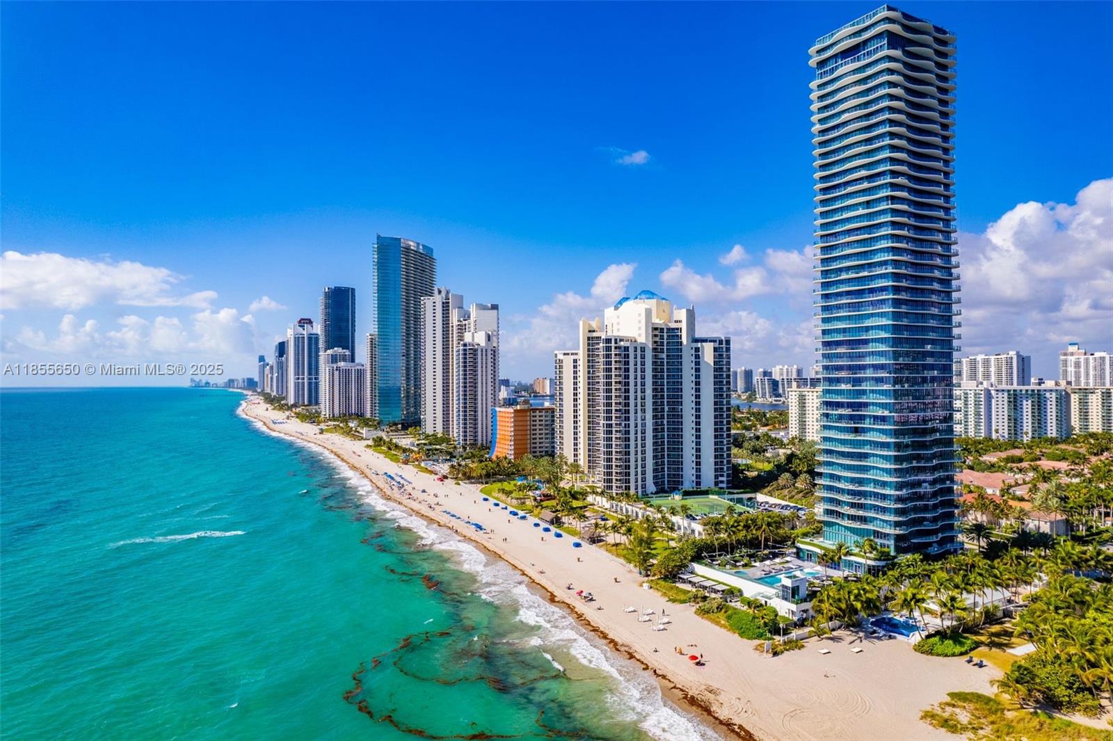 Welcome to Regalia, Sunny Isles Beach, with 360° unobstructed views and over 2,100 sq ft of wraparound terrace. Nearly 5,000 sq ft interiors with 4 bedrooms, office, 5.5 baths, gourmet kitchen, spa-style primary suite, wine cellar, smart home, marble floors, and private elevator foyer. Luxury amenities: beach service, pool, spa, fitness center, wine vault, kids’ playroom, and business center.