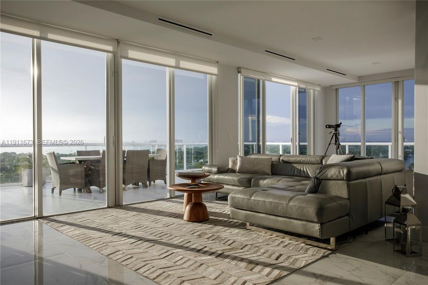 An address that captures every view and every moment.
Experience elevated coastal living in this one-of-a-kind just shy of 3,000 square foot penthouse at Carriage Club South. Spanning the entire northeast corner of the top floor, this residence offers sweeping ocean, inter-coastal and downtown skyline views from the expansive 970 square foot wraparound terrace.  Designed for effortless indoor-outdoor living, it features a sleek modern kitchen with Wolf and Sub-Zero appliances with spacious living/dining areas ideal for entertaining. The primary suite offers a spa-inspired bath and custom walk-in closet. PH1 is a rare offering and the crown jewel of the building, it defines luxury, privacy, and sophistication right on the sand.