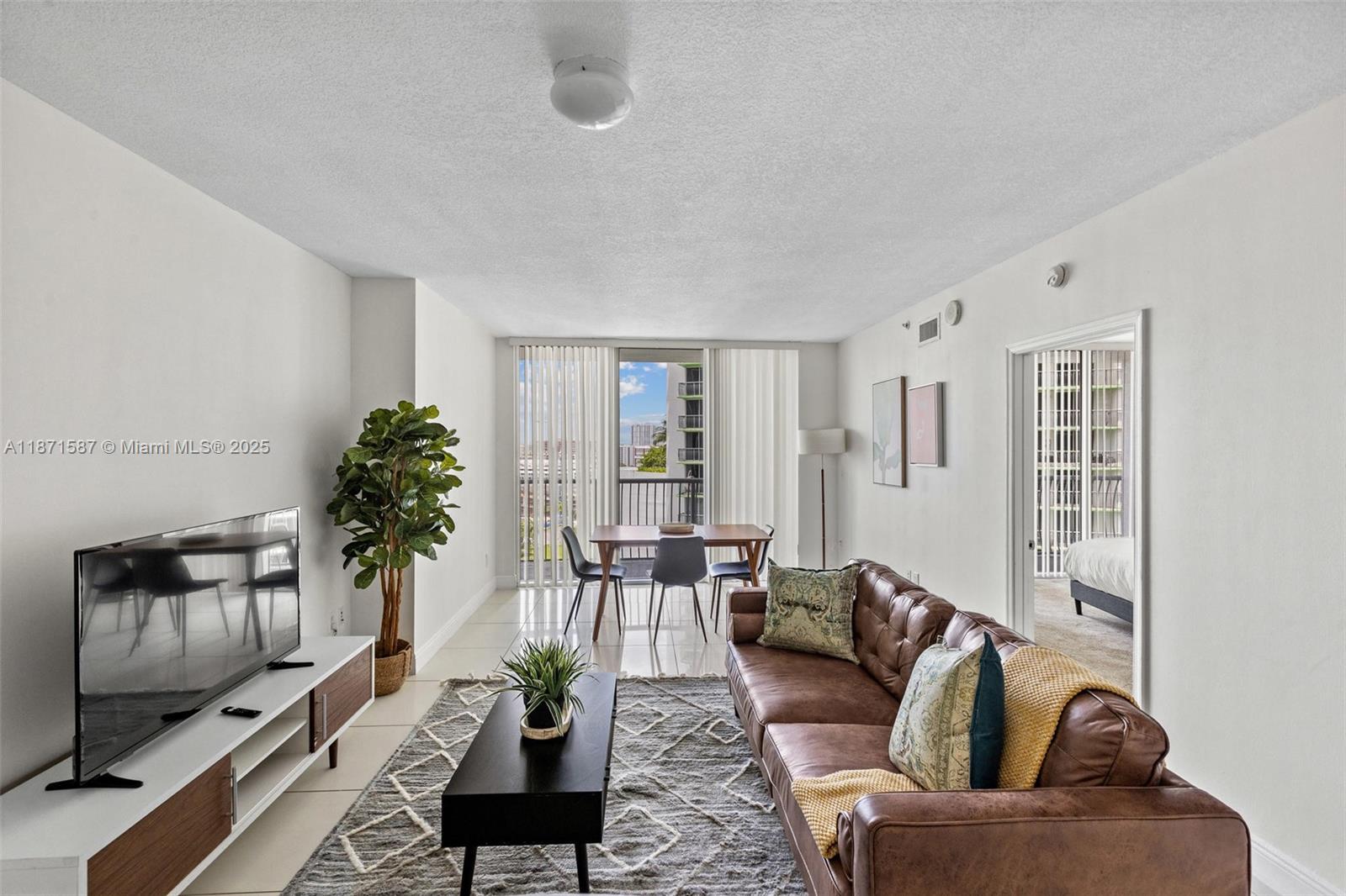 This fully furnished 1BD/1BA residence at Opera Tower offers a wall-to-wall balcony with Miami skyline and partial bay views. The modern kitchen and open layout make it move-in ready or a smart investment, with 30-day rentals allowed up to 12 times/year. Enjoy fantastic amenities: newly renovated pool, gym, 2 jacuzzis, BBQ area, business center, clubroom, media room, and 24/7 security. On-site conveniences include a market, dry cleaners, salon, and restaurant. Margaret Pace Park with bayfront walking paths, tennis, soccer, and volleyball courts. Walk to Publix, Miami Trolley, trendy restaurants, and cultural hotspots. Central location near Wynwood, Midtown, Brickell, Design District & beaches!