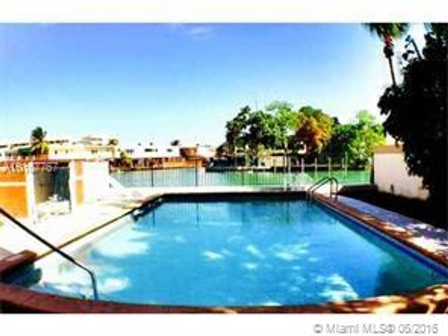 Beautiful 2 bedroom 2 full bathroom in a great MB neighborhood. Assigned Garage Parking Space. Blocks away from the beach, this corner unit has being completely remodeled with plenty of natural light.  Washer &Dryer inside unit.  Across from Normandy Fountain surrounded by restaurants easy access to I-95