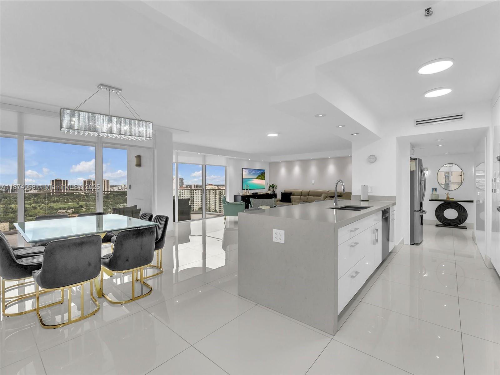 Completely renovated 3-bedroom at elegant Turnberry Towers with stunning Intracoastal and Ocean views through floor-to-ceiling windows. Enjoy wraparound balconies with beautiful views of the city, golf course, marina, and ocean. Interiors feature marble floors throughout, glass kitchen cabinets, stainless steel appliances, quartz counters, and a breakfast bar. Spacious master with custom closets. Washer and dryer in unit. Includes cable, WiFi, approx. 30 sq.ft. storage, and 2 garage spaces with valet. Amenities: 24/7 security, Shabbat elevator, fitness center, club and card rooms. Walk to golf course trail and Synagogue. Minutes to Aventura Mall, Publix, I-95, schools, and beaches. Free Aventura Shuttle stops at the building. Can be Furnished or Unfurnished
