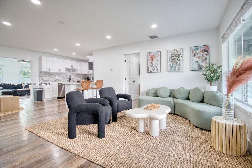 WON'T LAST! Income producing/Cash Cow or make it your dream home! Currently occupied as a Short Term Rental/AirBnb. Totally remodeled 3/2 SFR with Huge backyard. No HOA. Solar Panels, new roof, windows, plumbing, AC, flooring, kitchen, bathrooms, freshly painted inside and out, landscaping, driveway, pergola, appliances, fence. ALL NEW. Centrally located in a beautiful and quiet neighborhood just minutes from Hard Rock Casino Hotel, the famous Fort Lauderdale beach. Agent MUST accompany. Cameras throughout exterior.