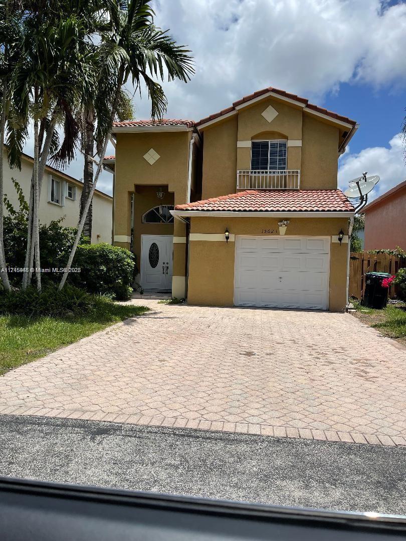 Spacious 3 bed 2 bath in Miami boasting 2 stories and ample backyard and driveway fit for entertaining guest and for families with multiple cars. One covered garage space and space for at least 3 additional cars in driveway. Primely located away in a quiet family oriented neighborhood not too close to the hustle and bustle of Miami but still close enough to the city for any work or weekend commutes! Easy to show go and show on combination lockbox, all showings scheduled via ShowAssist