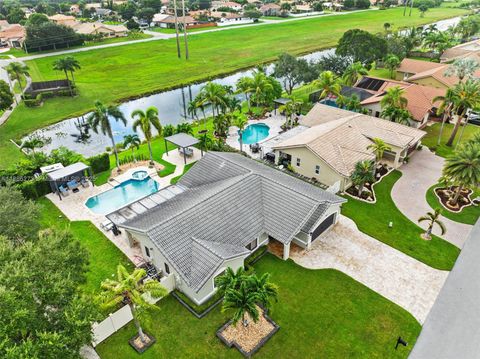 Photo of 6411 Olde Moat Way, Davie, FL 33331 (MLS # A11886273)