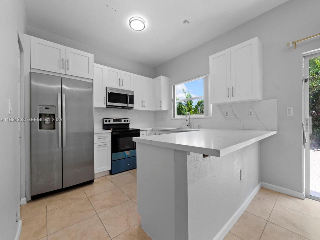 Photo of 5001 SW 140th Ter #5001, Miramar, FL 33027 (MLS # A11994338)