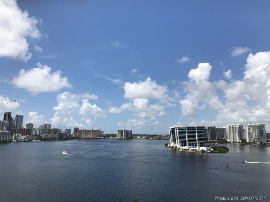 THIS VIEW IS MESMERIZING WITH INTRACOASTAL & BAY WATERS SURROUNDING THE ENTIRE UNIT. 2 BEDROOM 2 BATH WRAP AROUND TERRACE.  LIVING ROOM FLOWS INTO A FORMAL DINING ROOM OR DEPENDING ON YOUR LIFE STYLE COULD BE A DEN WHICH LEADS INTO A SPACIOUS BREAKFAST AREA & KITCHEN. SPLIT BEDROOM PLAN, MASTER SUITE HAS SEPARATE TUB & SHOWER & CLOSET SPACE GALORE.  SECOND BEDROOM IS HUGE.   FULL SIZE SIDE BY SIDE WASHER & DRYER. THIS CORNER UNIT HAS COMPLETE PRIVACY. THE BONUS IS IT'S MOVE IN CONDITION, FRESHLY PAINTED PLUS HURRICANE SHUTTERS. SHOW & SELL - WON'T LAST.