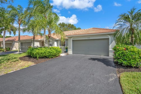 Photo of 1922 Pisces Ter, Weston, FL 33327 (MLS # A12103774)