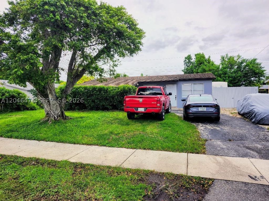 Photo of 4301 NW 59th Ct, North Lauderdale, FL 33319 (MLS # A12046476)