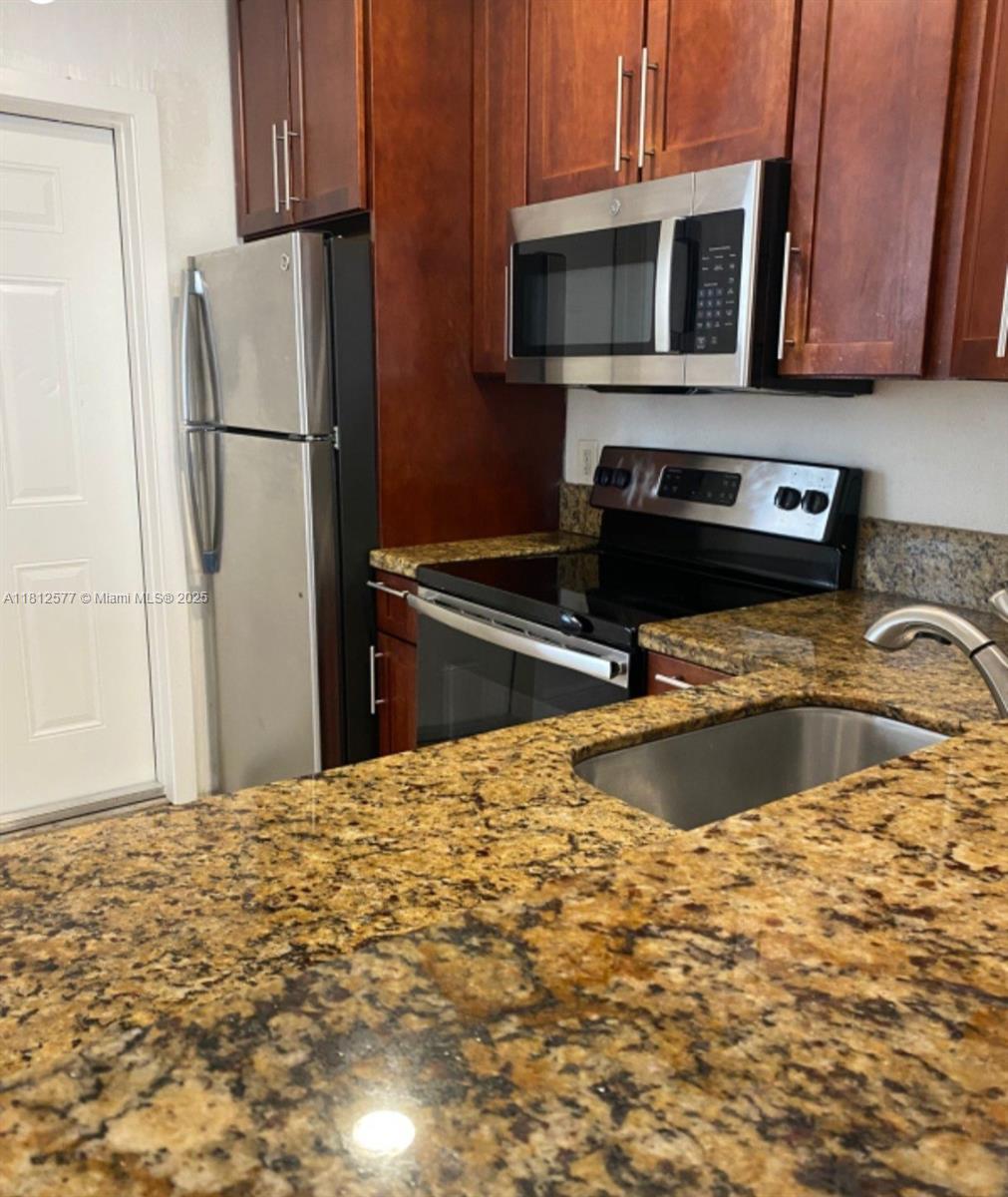 RITZ ROYAL PALM CONDO - Residential