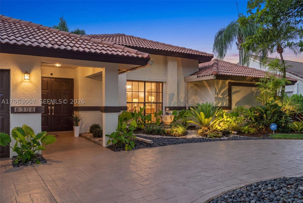 Photo of 8308 NW 74th St, Tamarac, FL 33321 (MLS # A12063057)