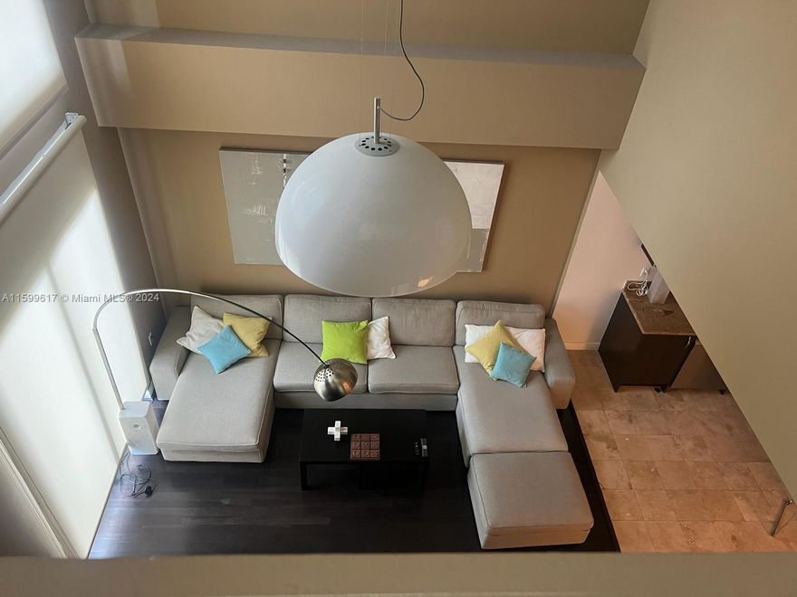 Experience Miami luxury in this rare Duo two-story condo. 2-bed, 2.5-bath, 2 parking spaces,exquisite laminate floors. Modern kitchen, new appliances. Downstairs suite with terrace, loft-style master with 2nd terrace, walk-in closet, luxury bath. New AC, fridge. Full-service Duo: heated pool, jacuzzi, gym, tennis. Near restaurants, supermarkets, beach, Aventura Mall, Gulfstream Park. Fully furnished, largest 2-bedroom unit, in-unit washer/dryer, covered parking. Renovated, high ceilings, EV charging. Vacant, ready for viewing.
