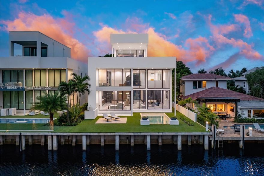 Introducing a waterfront masterpiece by Prince Bay Luxury Homes in Las Olas Isles. This new 6-bed, 6.5-bath home spans 4,511 sqft. Meticulous attention to detail and modern elegance helps define this home, which comes equipped with high-impact windows, Arebescato flooring, and natural-looking veneer cabinetry. The waterfront location spanning 50 feet offers gorgeous views. This kitchen is a culinary haven, featuring Thermador appliances, and natural wood finishes. Throughout the interior, find a tasteful fusion of porcelain and marble, illuminated by both ample LED and recessed lighting. Live luxuriously in this exquisite waterfront residence.