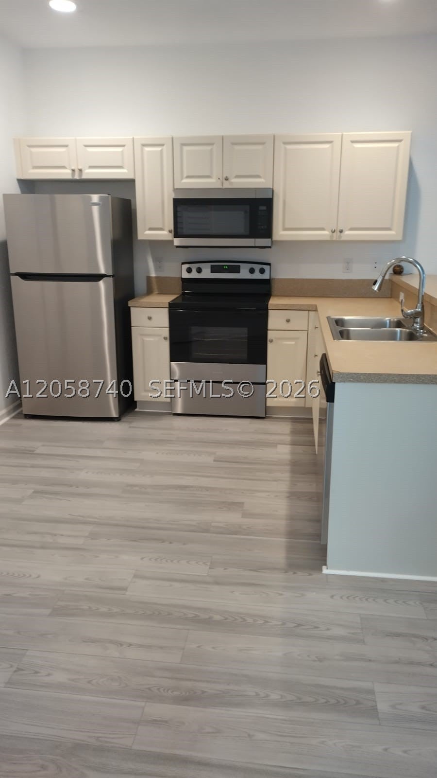 Photo of 1960 Freeport Ln #1960, Riviera Beach, FL 33404 (MLS # A12058740)