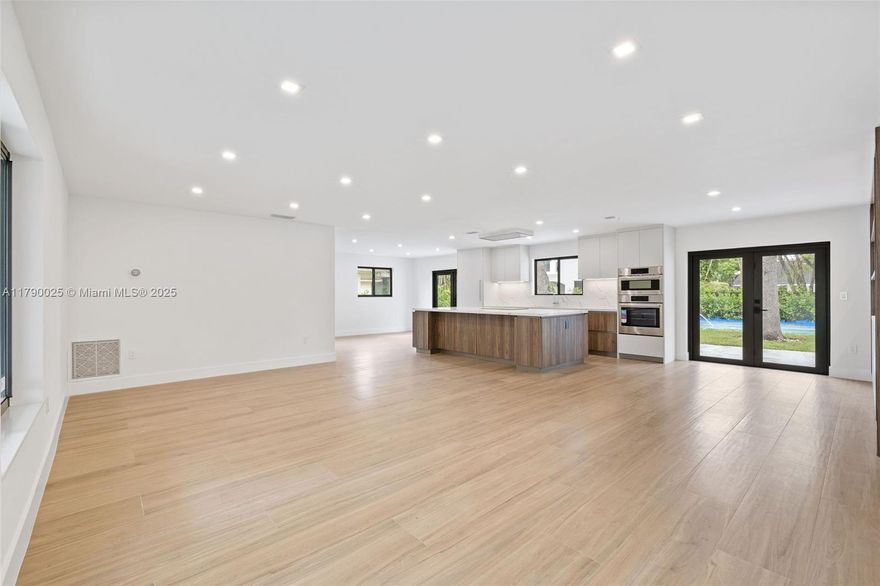 2025 stylish renovation on a 4 bedroom/2.5 bath 2 car garage, turnkey pool home in the City of South Miami, close to downtown and U of Miami. Extensively updated with pool, impact windows, ITALKRAFT kitchen, new appliances, closets, doors, flooring and much more. The photos speak for themselves! Huge 11,000 sft fenced lot, within walking distance to parks and shops. Benefit from the incredible growth of South Miami while living on a charming tree lined street.  Come see this home today and get ready to move in.