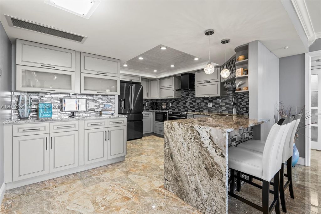 Photo of 2425 Presidential Way #PH1, West Palm Beach, FL 33401 (MLS # A12017284)