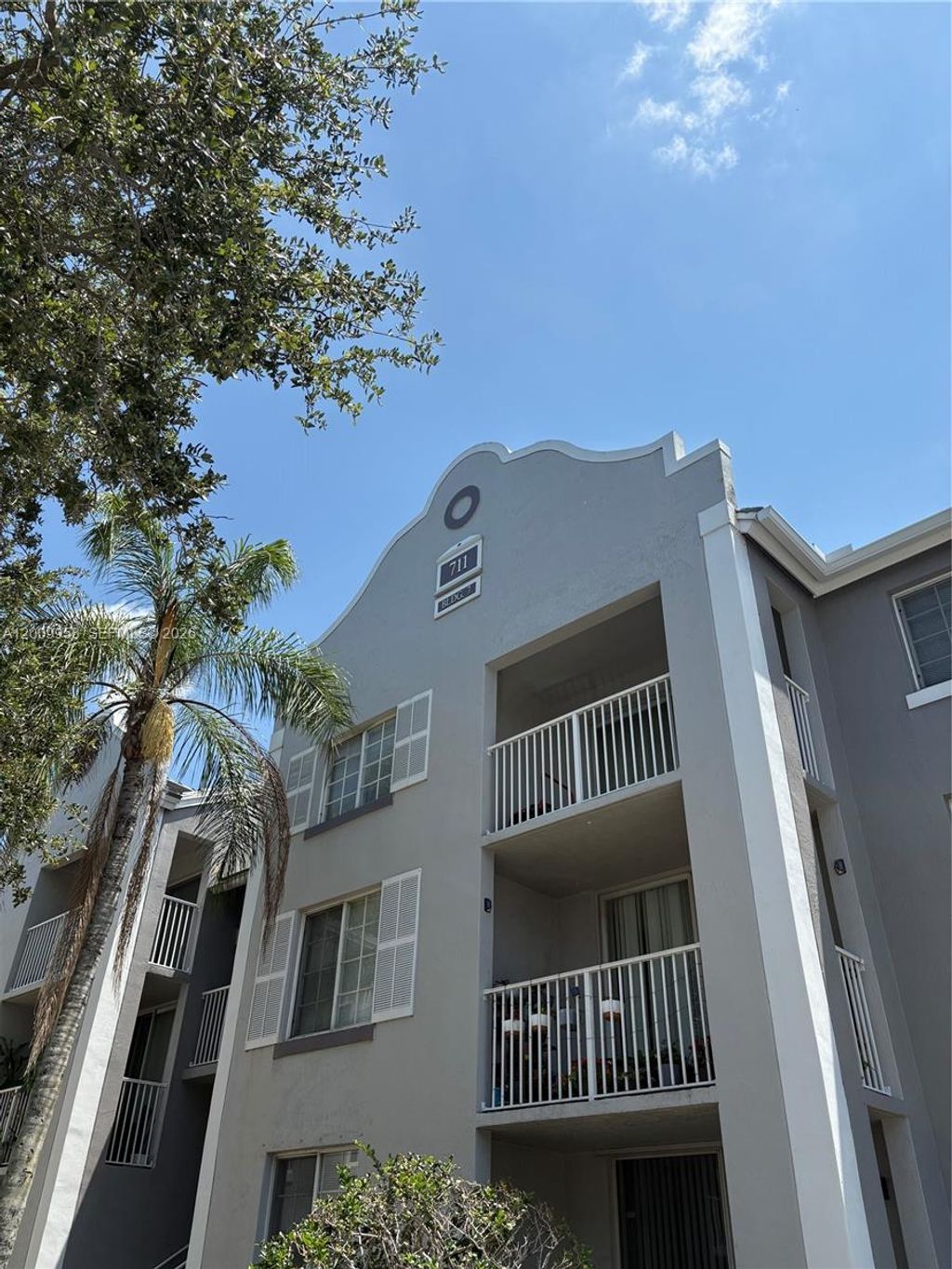Photo of 711 SW 111th Way #202, Pembroke Pines, FL 33025 (MLS # A12009958)