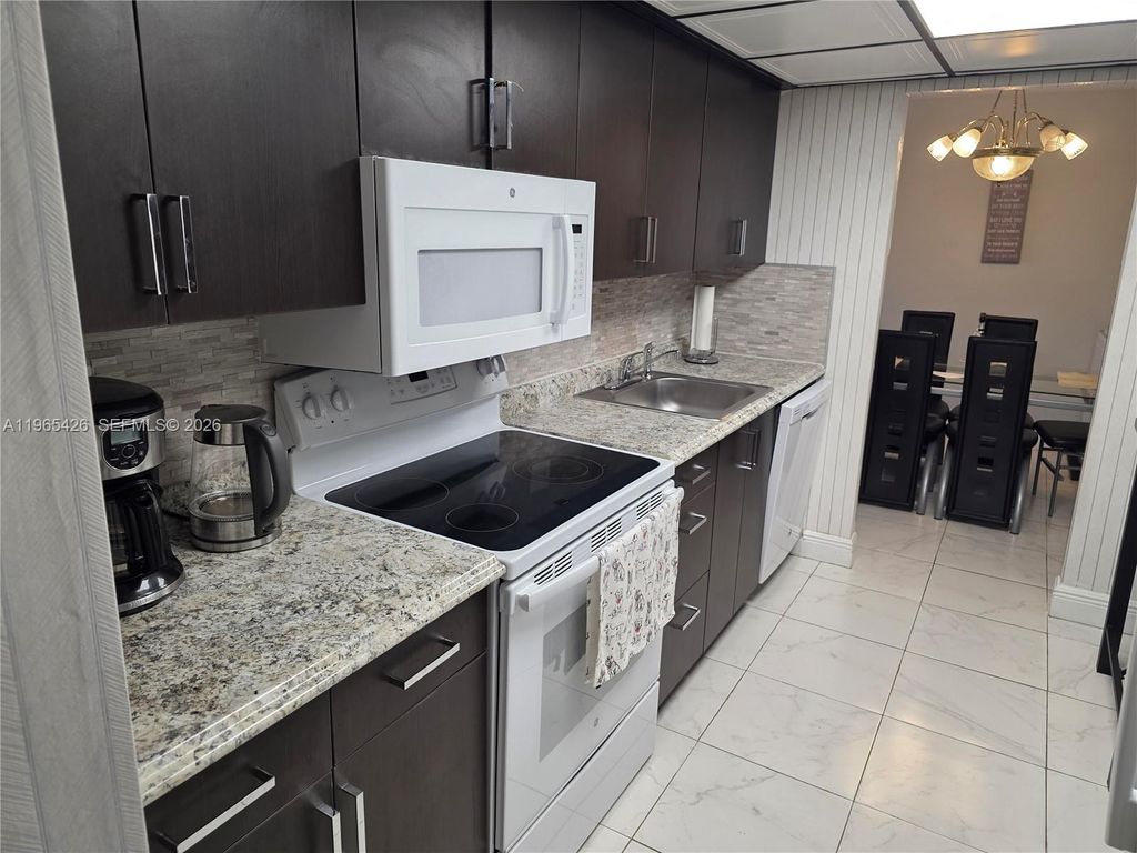 Photo of 3771 Environ Blvd #348, Lauderhill, FL 33319 (MLS # A11965426)