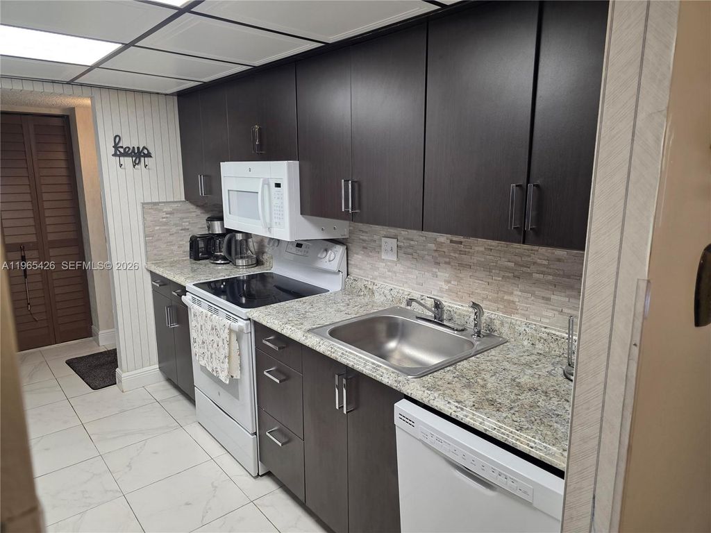 Photo of 3771 Environ Blvd #348, Lauderhill, FL 33319 (MLS # A11965426)