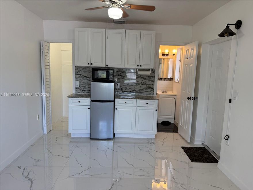 Renovated efficiency in Ives Estates ideally located just minutes from I-95, Aventura and popular shopping, dining and entertainment destinations. This cozy unit has its own private entrance, updated tile floor, full bathroom, and kitchenette. Comes with one designated parking space and all utilities- water and electricity are covered in the rent. Move in with just first month's rent and a security deposit. No pets allowed. Applicants must complete background and credit screening with employment verification. This is the ideal home for an individual looking for a nice quiet residence. Schedule your showing today.