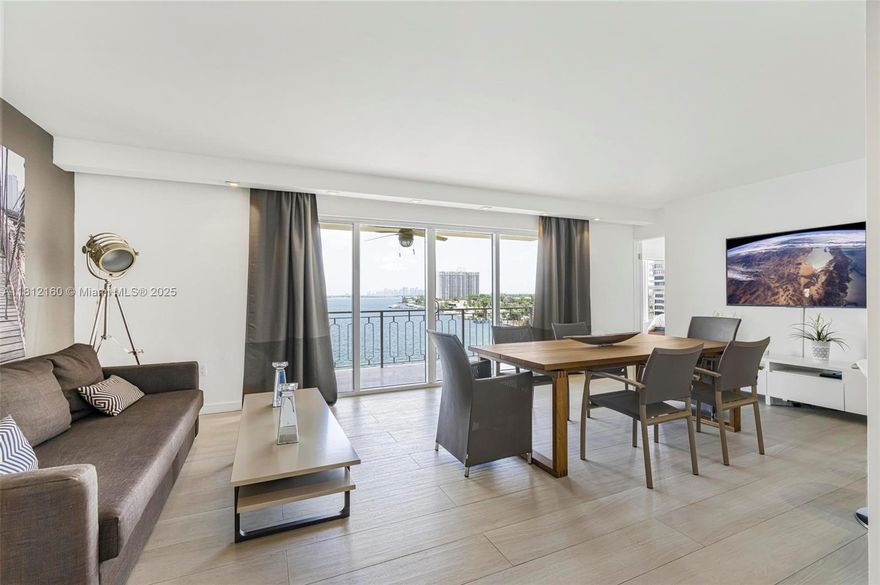 Absolutely the best fully renovated unit in the building, featuring hurricane-impact windows and porcelain floors throughout. This split 2-bedroom open floor plan offers breathtaking bay and water views—come see it for yourself! This outstanding unit is located in the calm and prestigious Jockey Club community, which includes tennis courts, a waterfront pool, and a marina currently undergoing restoration—further reaffirming the property’s value. AVAILABLE NOW