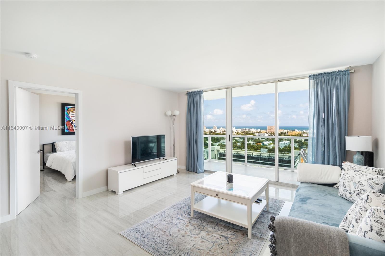 Live the Miami Beach lifestyle in this furnished 3BR/2BA condo at The Floridian on West Ave. This high-floor residence features stunning panoramic ocean and city views through floor-to-ceiling windows. Enjoy a spacious living area, a fully equipped kitchen, and a primary suite with king-size bed, walk-in closet, and ensuite bath. Two additional bedrooms offer queen beds and share a full bath. The Floridian offers top-tier amenities including two bayfront pools, a fitness center, tennis courts, spa, valet, and 24-hour security. Ideally located near South Beach dining, shopping, and nightlife, this luxury condo is move-in ready and perfect for those seeking comfort, convenience, and style.