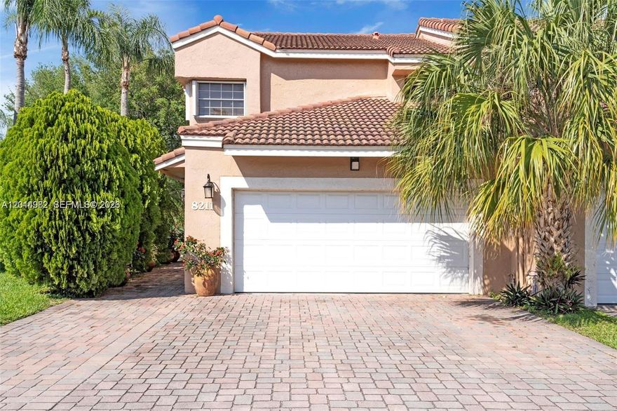 Very spacious 3 bedroom, 2.5 bathroom, corner unit with 2 car garage. New laminate flooring all downstairs and open floorplan, great for entertaining. Custom made kitchen, tons of cabinet space, with a massive island. All bedrooms have California closets and bathrooms have been tastefully updated. New Pergola in backyard. Located in a quiet neighborhood in close proximity to the I75. Low HOA and it covers the roof of the property. Home is very well taken care of and ready for a new family to enjoy.