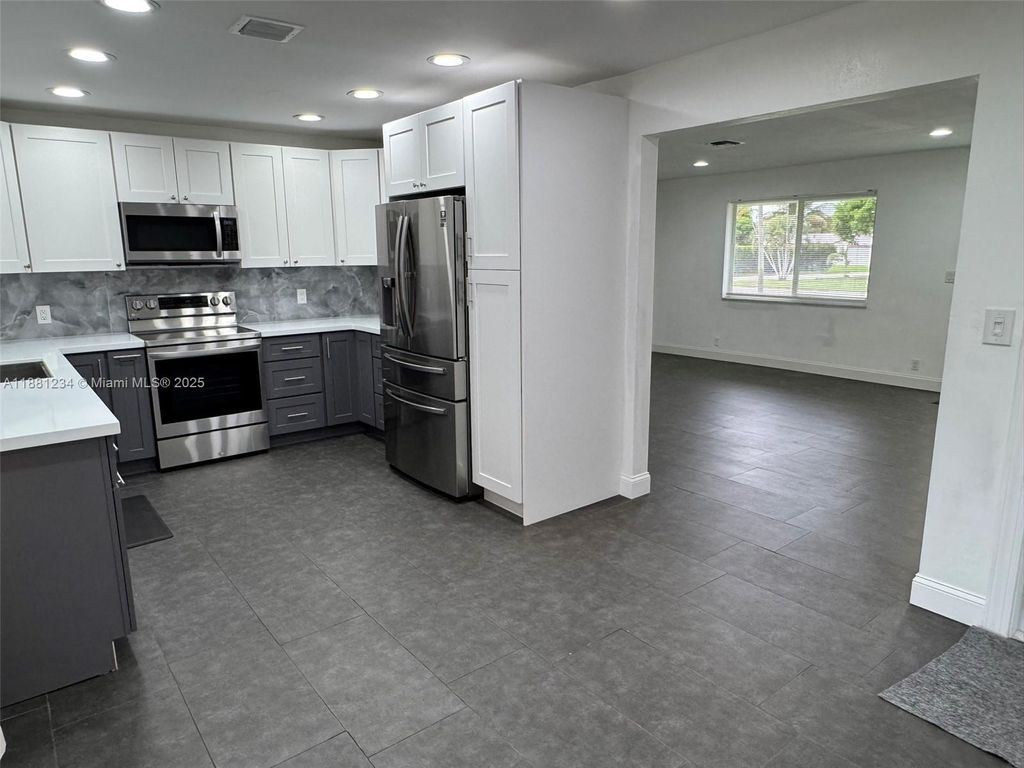 Photo of 1020 NW 45th Ct, Fort Lauderdale, FL 33309 (MLS # A11881234)