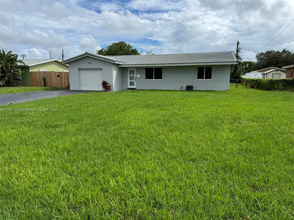 Photo of 1020 NW 45th Ct, Fort Lauderdale, FL 33309 (MLS # A11881234)