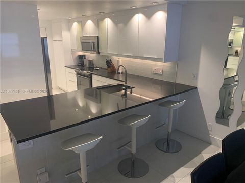 Photo of 2326 S Cypress Bend Dr #221, Pompano Beach, FL 33069 (MLS # A11968281)