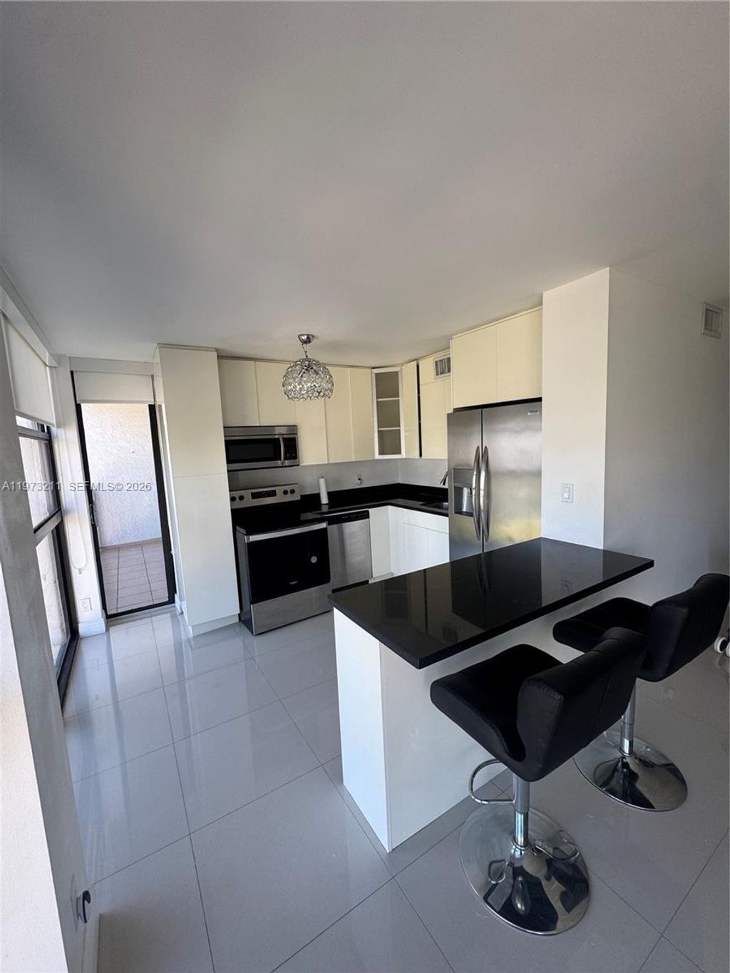 Photo of 400 Leslie Dr #602, Hallandale Beach, FL 33009 (MLS # A11973211)