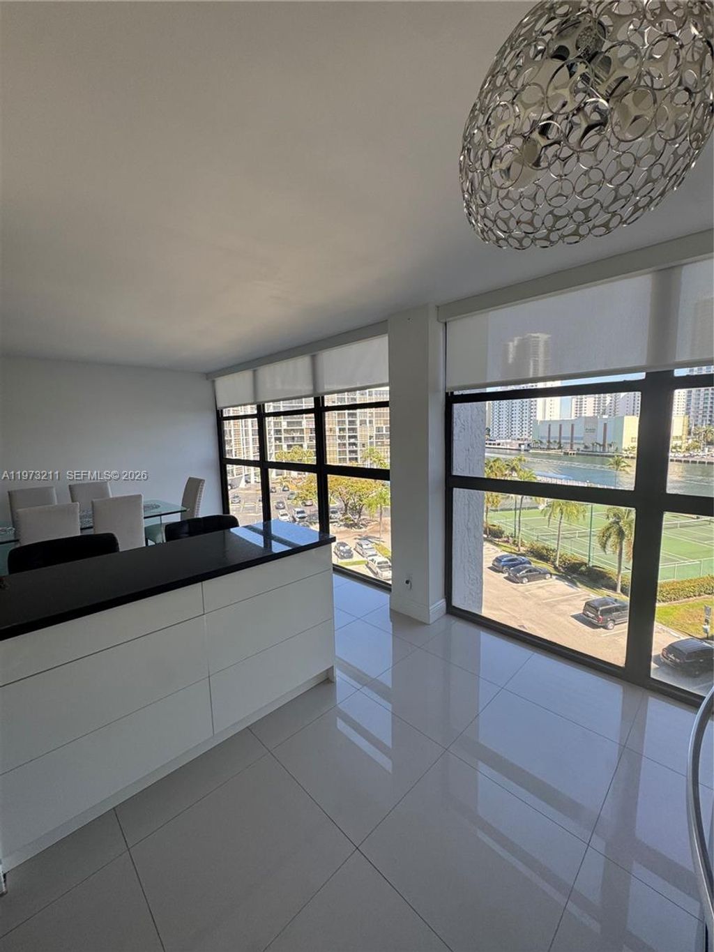 Photo of 400 Leslie Dr #602, Hallandale Beach, FL 33009 (MLS # A11973211)