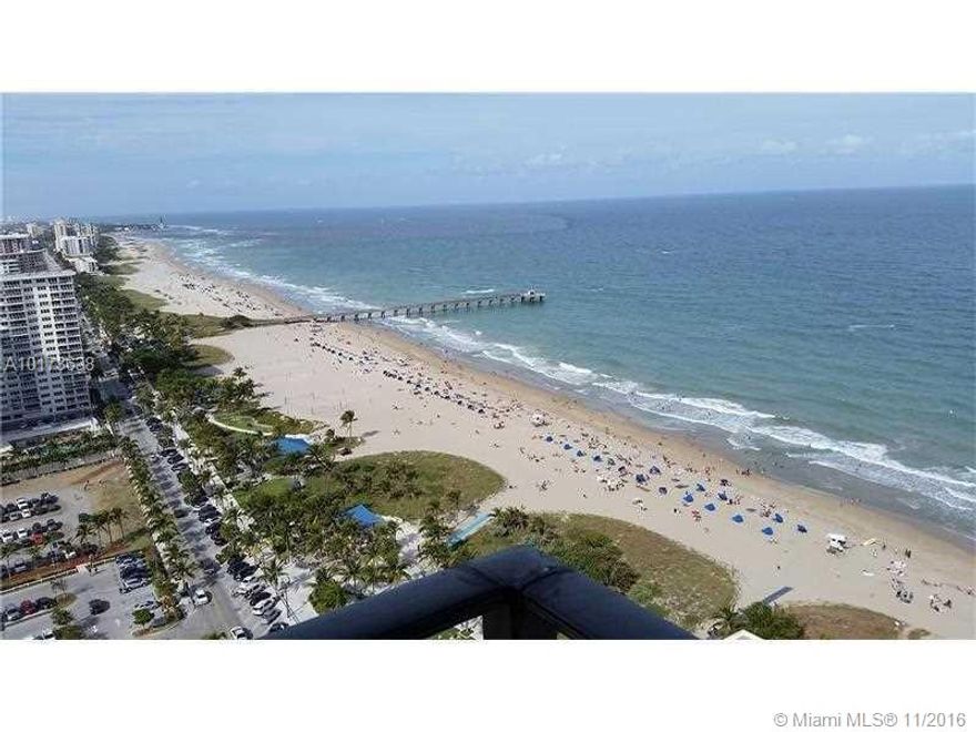 If you are dreaming of a perfectly renovated residence with endless ocean views, oceanfront pools & more amenities that can be listed here your dream has come true. Upon entering magnificent views draw you across the open living & dining area to the dramatic forever views (from every room) of the wide beach & newly renovated pier & beachfront park.  New tile floors, remodeled white-on-white kitchen with granite counters & backsplash. Done in soothing, contemporary blues & greys. Truly a pleasure to show!