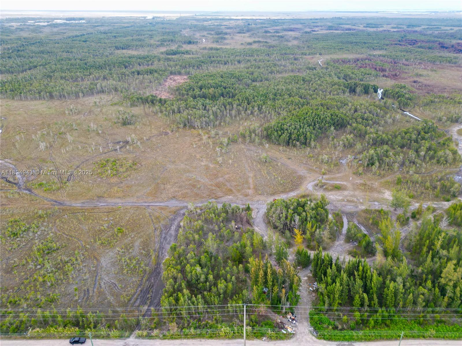 MIAMI EVERGLADE LAND COMP - Land