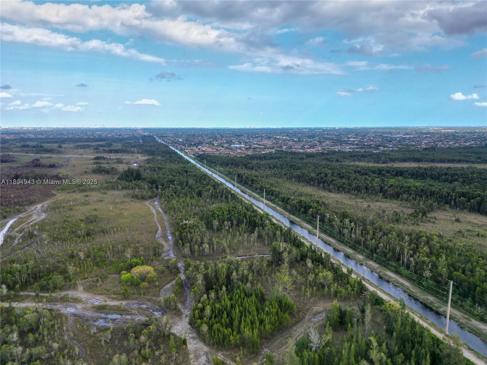 MIAMI EVERGLADE LAND COMP - Land
