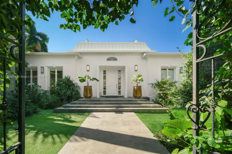 Elegant and dramatic pool home on Fabulous La Gorce Island.  Total of 6 bedrooms, 5 in the main house plus a separate outside loft bedroom all in a stunning French Chateau setting. Big beautiful rooms with volume ceilings, impact windows and doors, plus hardwood floors throughout. Formal living area, relaxing den, open gourmet kitchen, and an abundance of natural light. Big beautiful French Doors surround the home and allow for easy access to the exquisite private pool and  outdoor area, flawless for entertaining, outdoor dining, relaxing, or family fun.  A perfect move in condition home in a perfect setting.