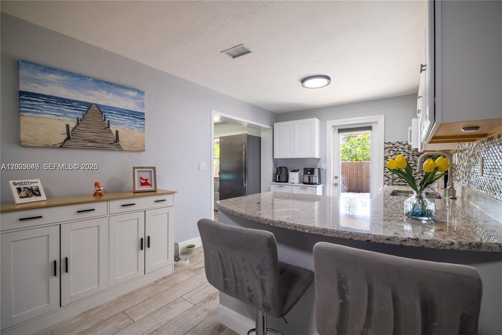 Photo of 2950 NE 11th Ave, Pompano Beach, FL 33064 (MLS # A12003649)