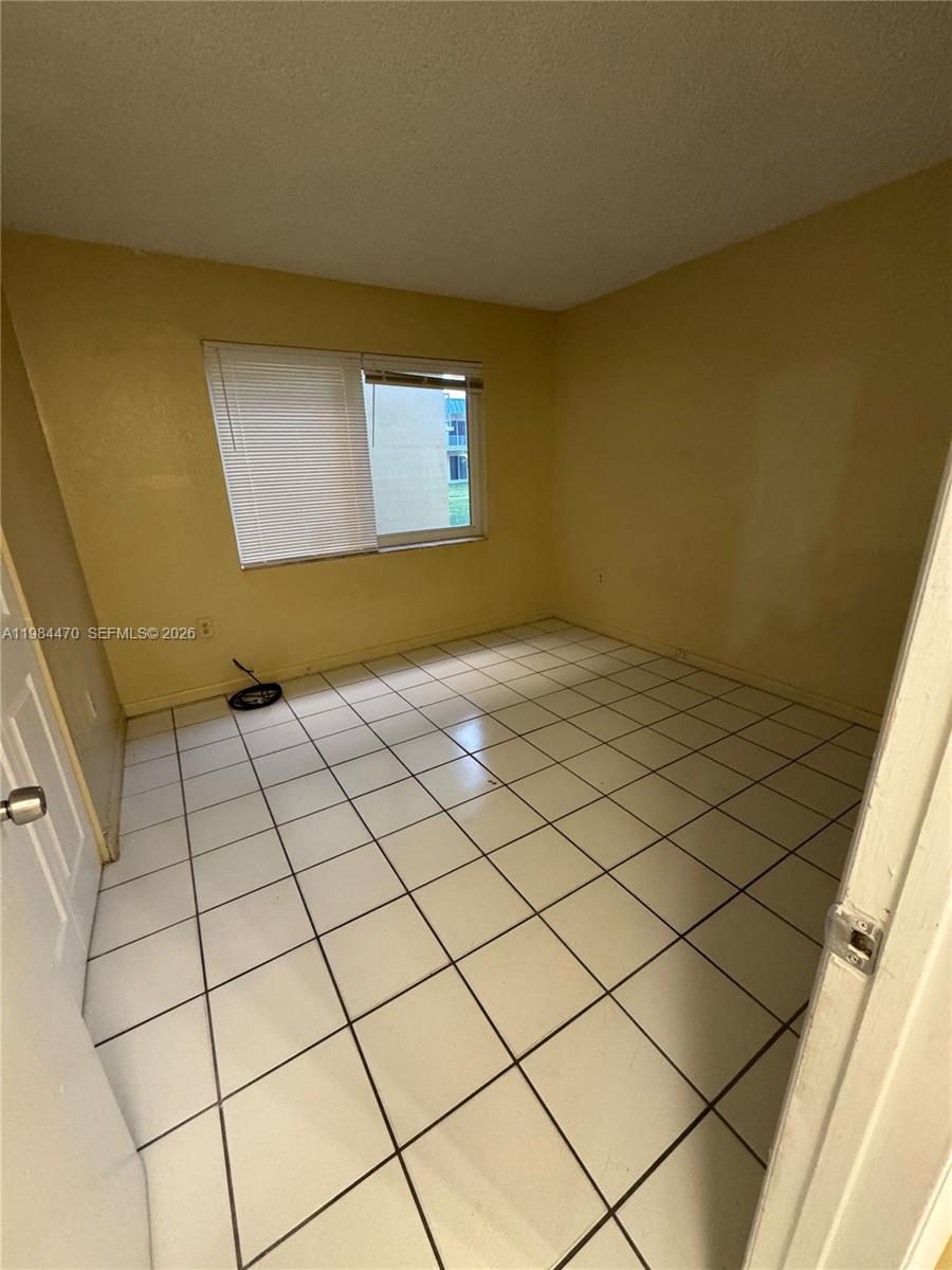 NEW WORLD CONDO APTS IV - Residential Lease