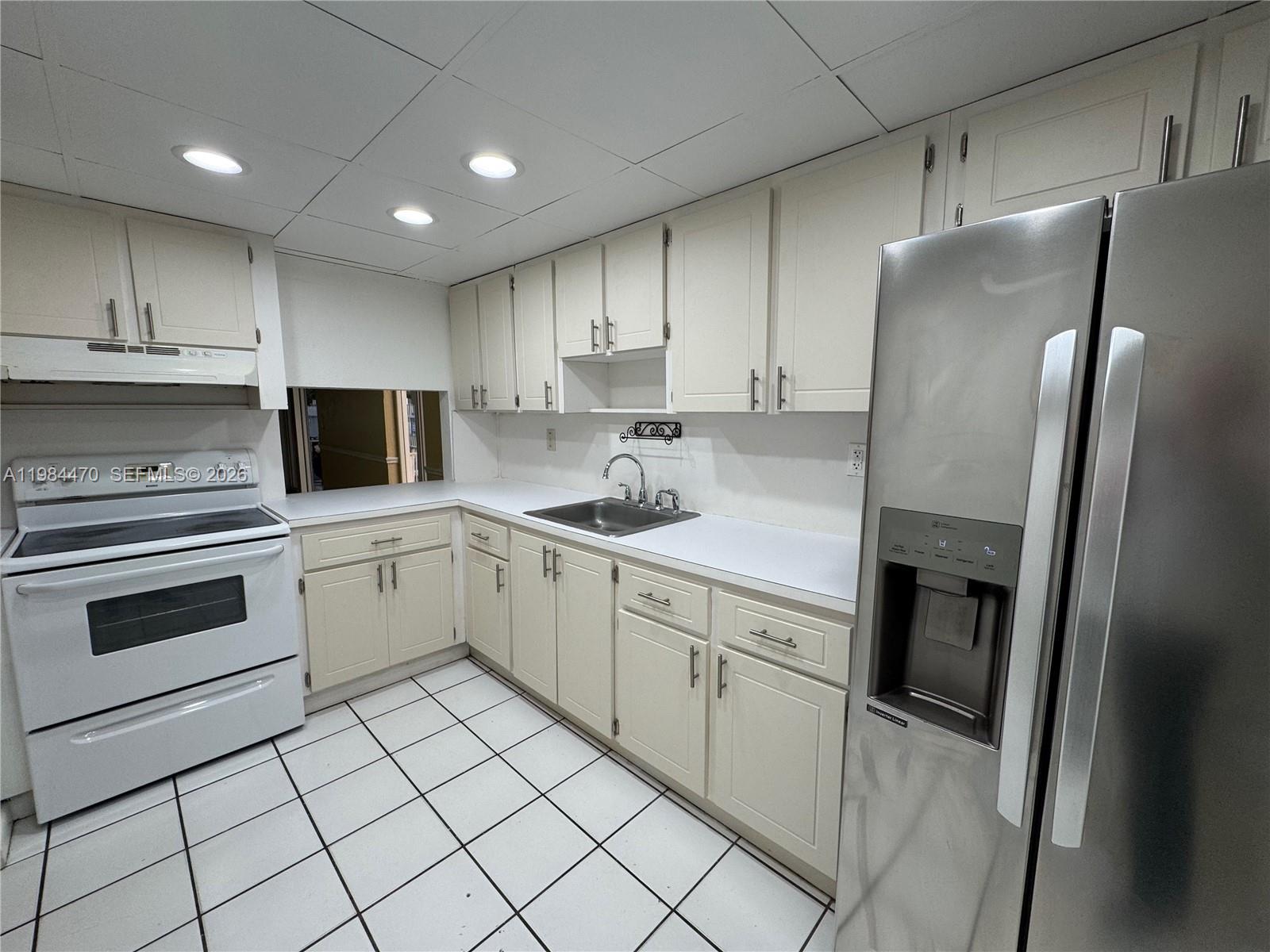 NEW WORLD CONDO APTS IV - Residential Lease