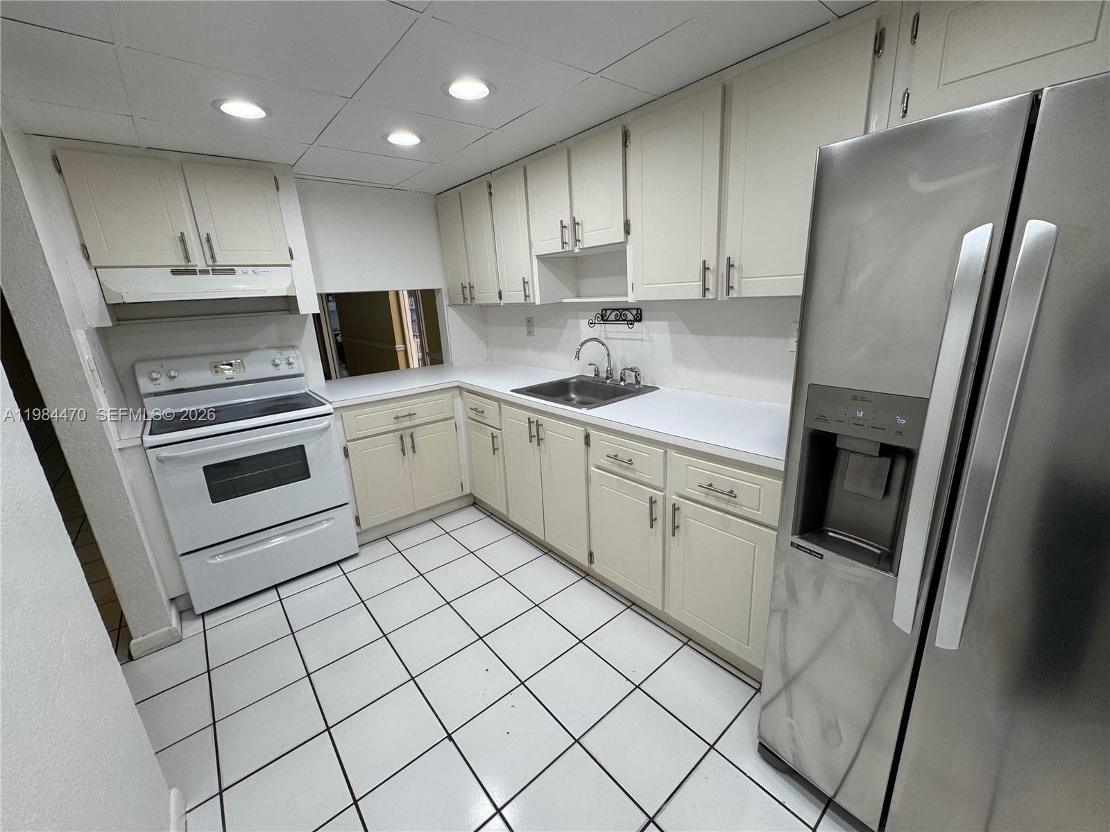 NEW WORLD CONDO APTS IV - Residential Lease