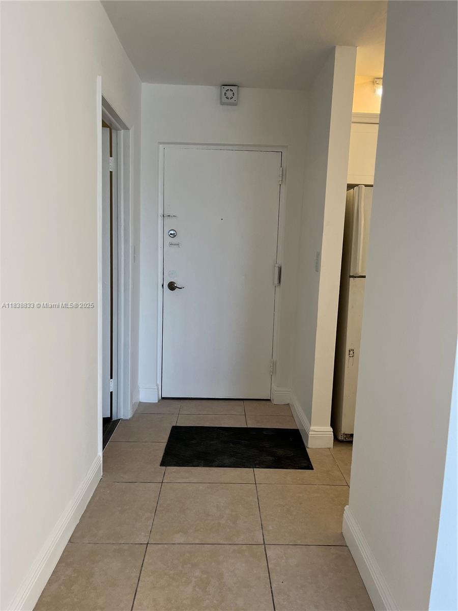 Cozy two bedrooms, one and a half bathroom. Spacious apartment and conveniently located on the 4th floor. Walk-in closet in the master bedroom and large closet in the second bedroom. No carpet floors. Water is included. The unit has a large storage room and impact windows. The roof of the building and the Mail Boxes are new. Parking and guest parking in the center of the condominium. The property is located next to a shopping center with various businesses including a supermarket and less than two blocks from US1.