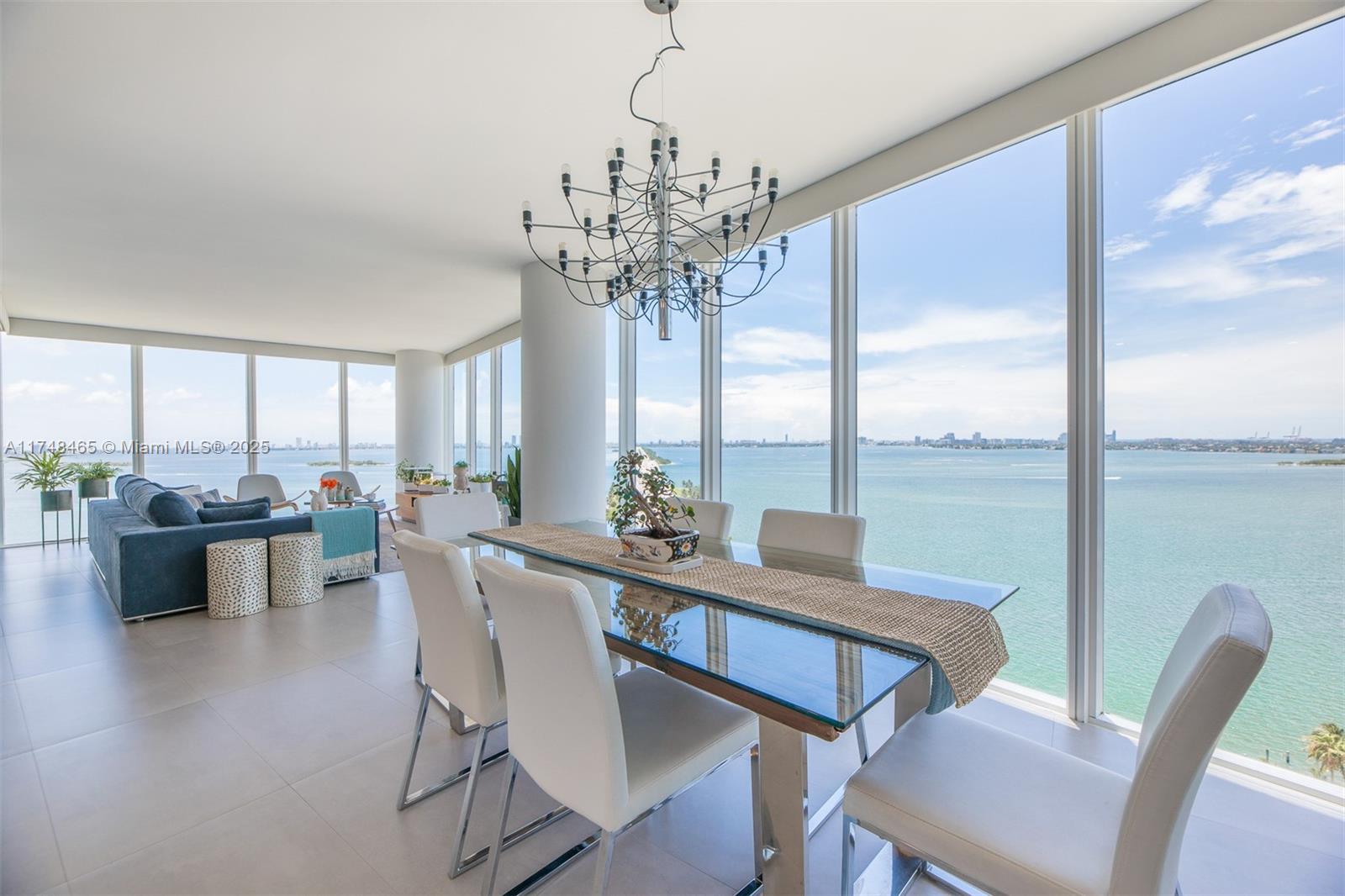 Fully Furnished oversized 1870 SF residence with unobstructed Bay views. 12 Line Corner, 2 bedroom suites + Large Den, 3 full baths. High end renovation including Porcelanato floors, custom kitchen, all built-in appliances, Cristallo countertops. Floor-ceiling impact glass, motorized shades & blackouts, 2 ACs, balcony. 1 assigned Parking Space included. Additional spaces available with Valet. amenities include 2 pools, hot tubs, Sauna, Movie Theater, massive GYM, Cycling, Kids Play, Game Room, Party Room, Business Ctr, BBQ, concierge, mini market, Valet. Semi private elevator foyer. Live by Design District, Midtown. Close to Wynwood, Miami Beach, MIA airport. Lobby renovation under way. Available from March 15- October 31. Minimum 6months +1 day. No pets. Rental insurance required.