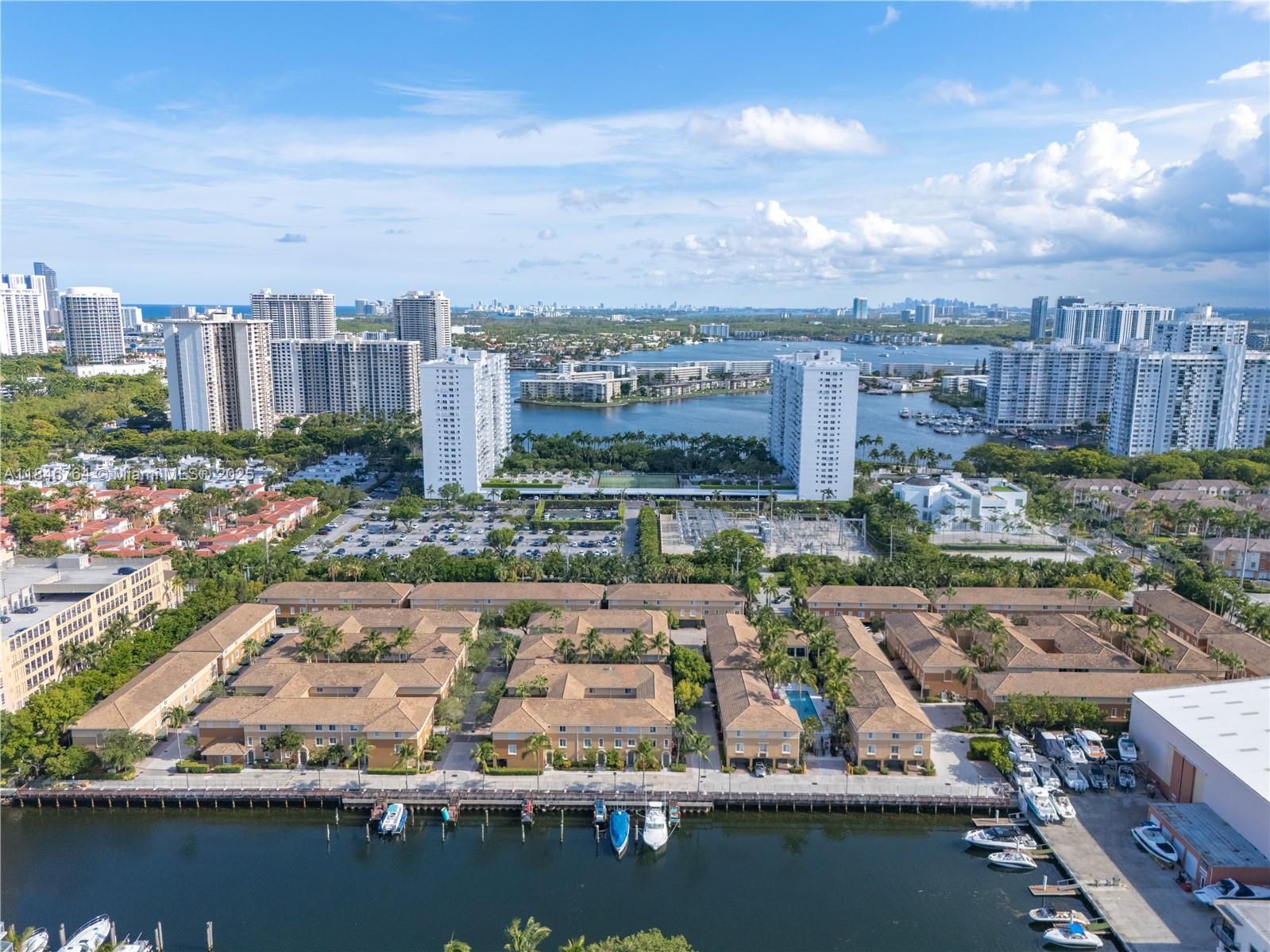 The perfect fit! Tri-level 3 bedrooms, 2 baths, with a private 2 car garage located in the waterside community of Aventi in Aventura. This corner unit offers an spacious well distribute floor-plan full of natural light, an open concept kitchen with stainless steel appliances next to a versatile den/ family room, washer and dryer, and extra storage closet space. The community offers access to the marina boardwalk perfect for waterside strolls, resort-style pool. Enjoy a hassle free living, rent payment includes cable tv, high speed internet. Ideally located within walking distance to restaurants, shops, parks, the Aventura Mall and house of worship. Can be rented fully furnished at $4,200 per month.